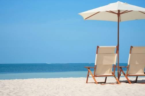 Beach chairs and umbrella on the beach